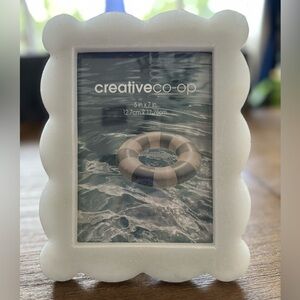 Scalloped Marble Frame from Crwative Co-Op
